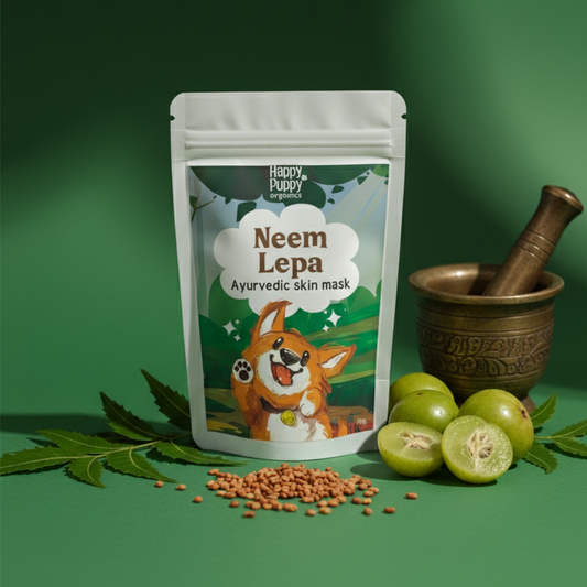 Happy Puppy Neem Lepa Ayurvedic skin mask packaging on a green background with neem leaves and seeds.