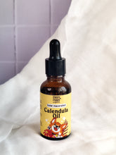 Load image into Gallery viewer, Wild harvested Calendula Oil
